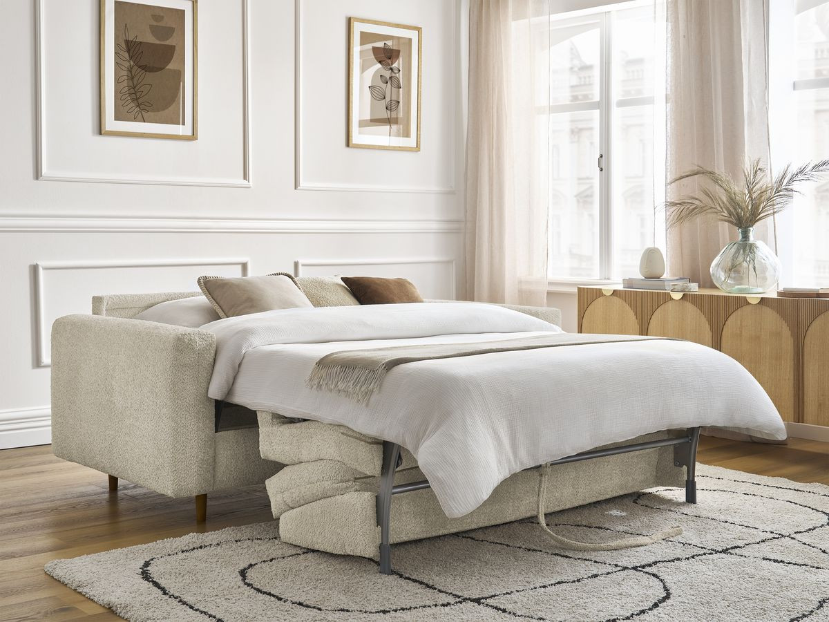 Bobochic Cocoone mit ausgeklappter und bezogener Liegefläche im Wohnzimmer