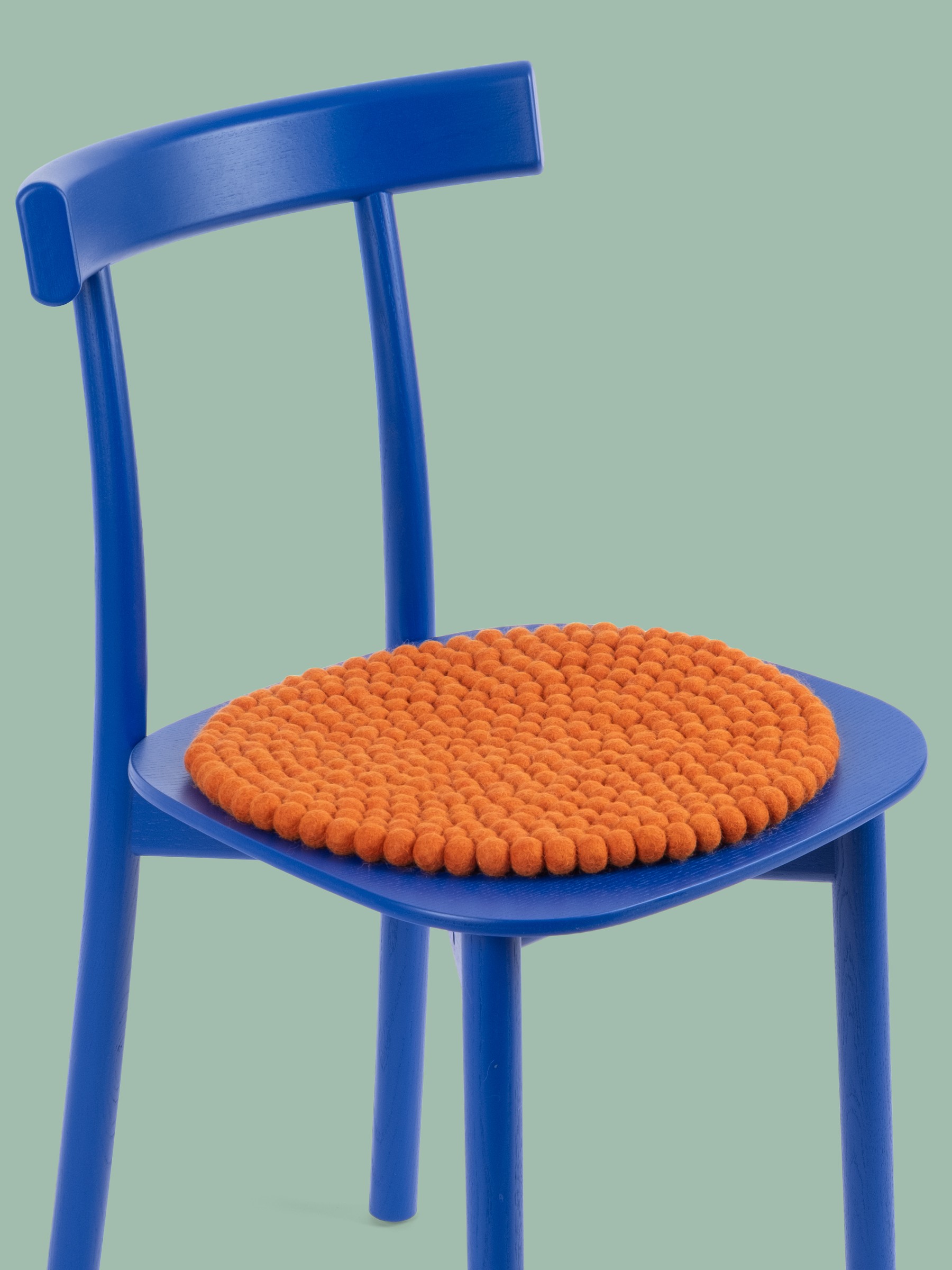 myfelt Afra Filzkugel-Sitzauflage Orange Ø 36 cm