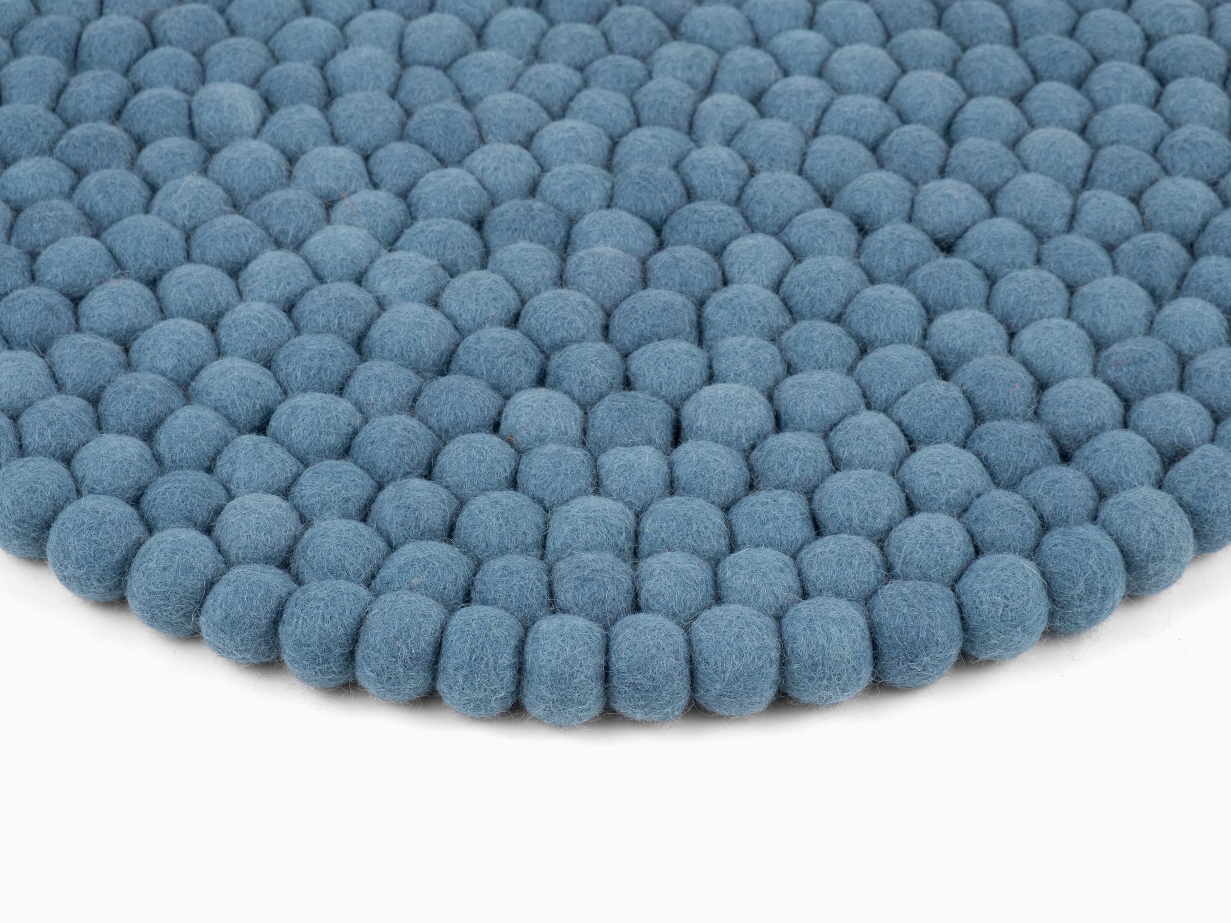 nilo-filzkugel-sitzauflage-rund-blau-draufsicht-nah-1