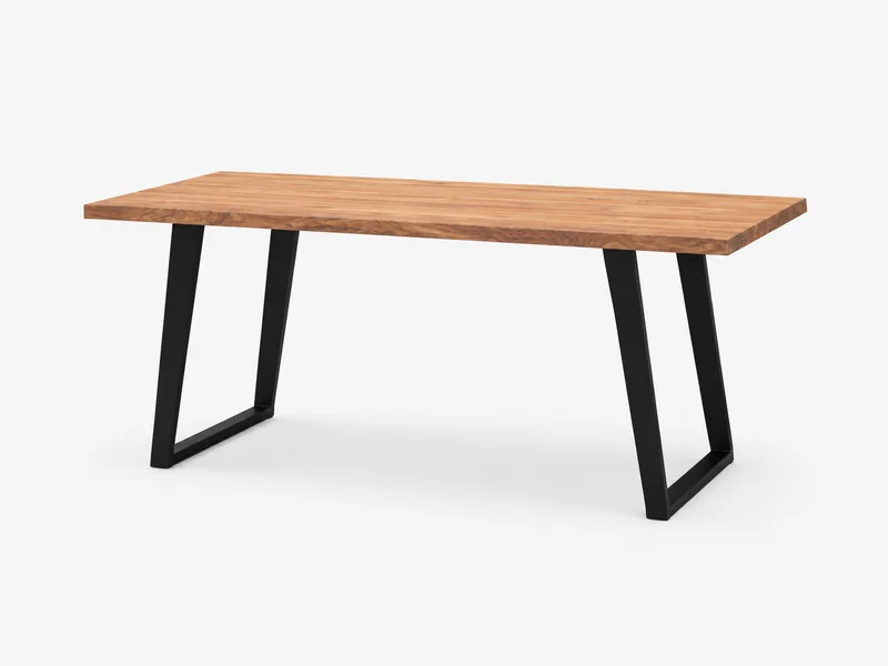 Schreibtisch mit Holzplatte und schwarzen trapezförmigen Metallbeinen